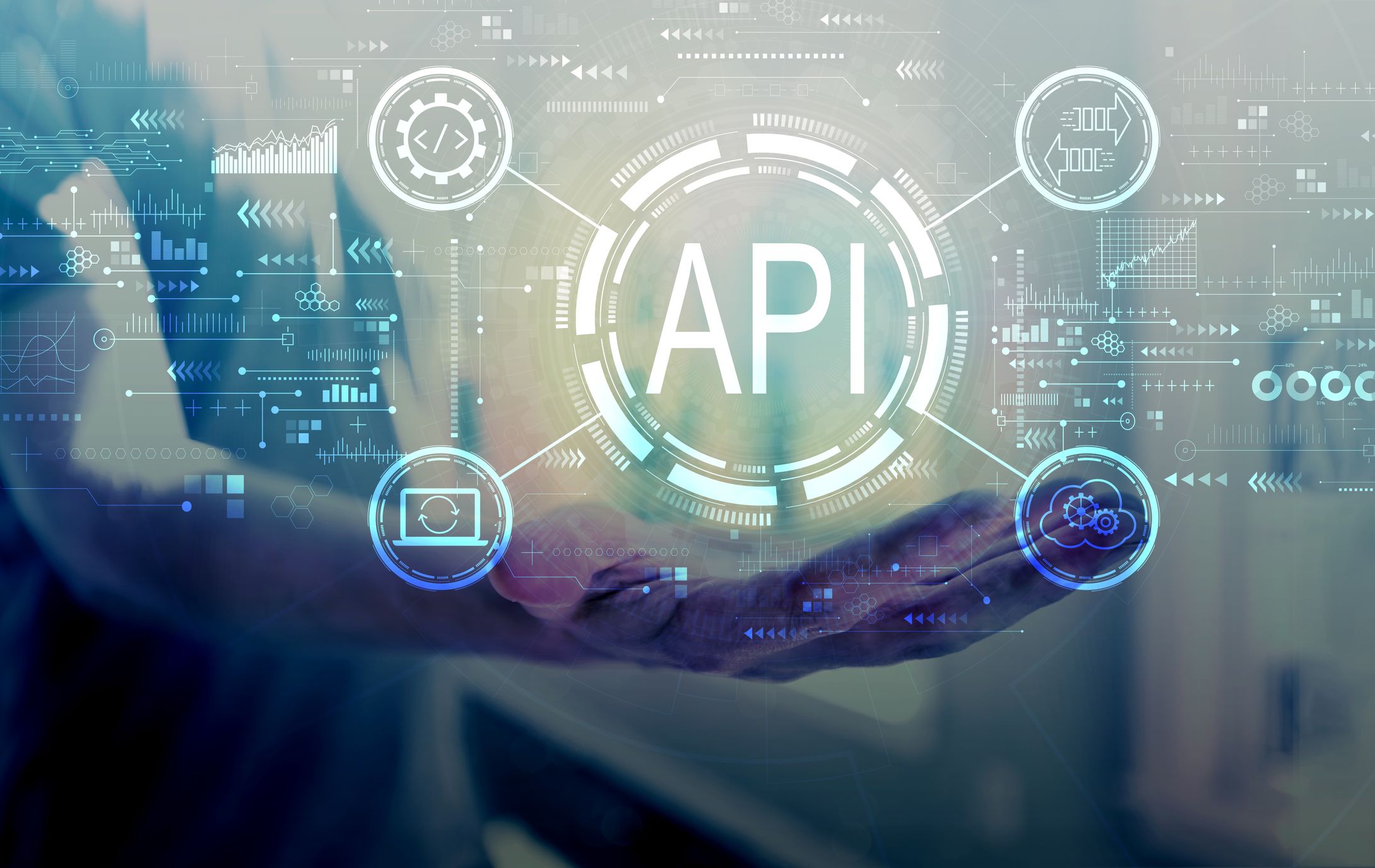 A hand holding a circle with "API" imagery